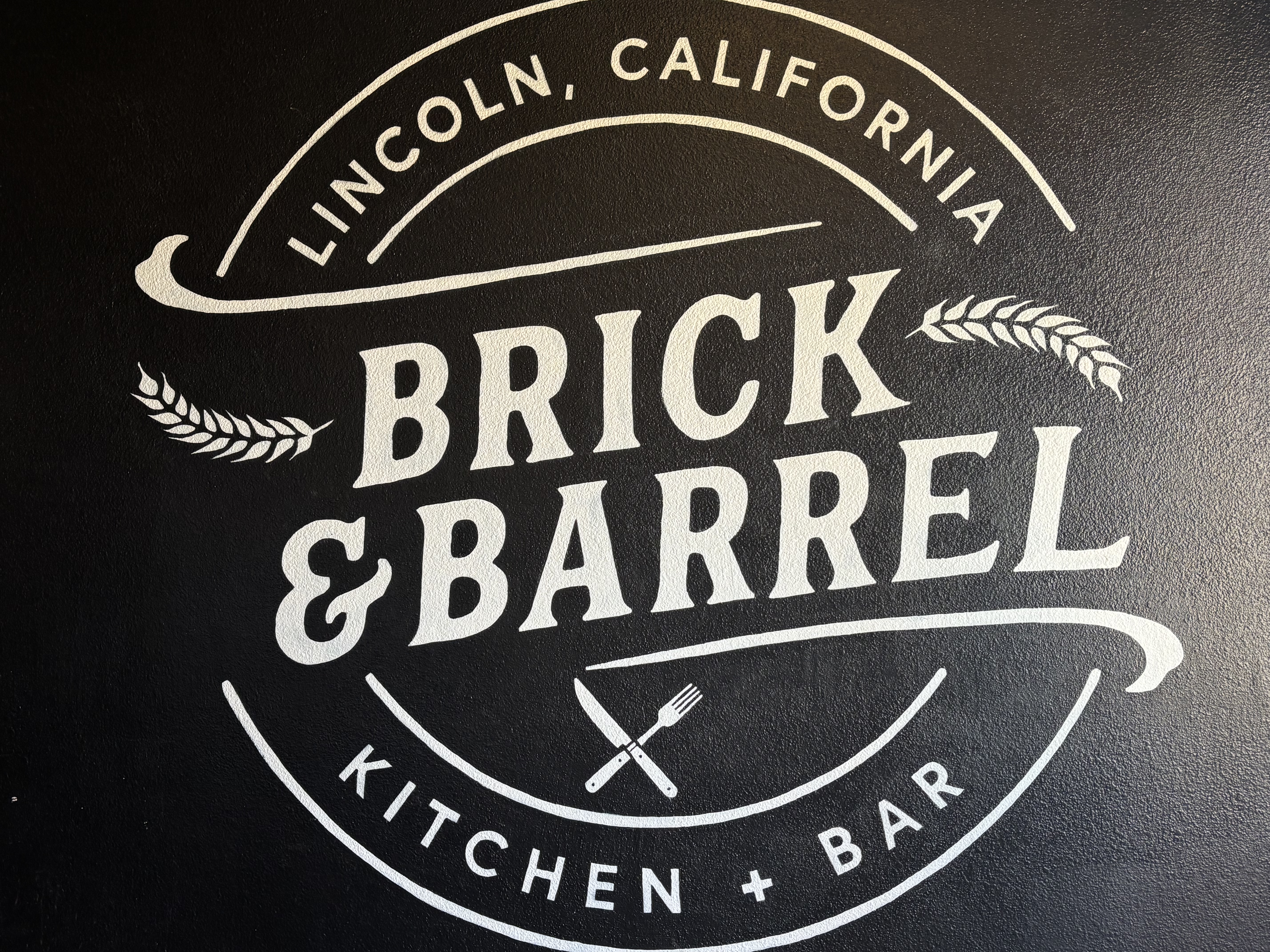 Brick & Barrel logo wall