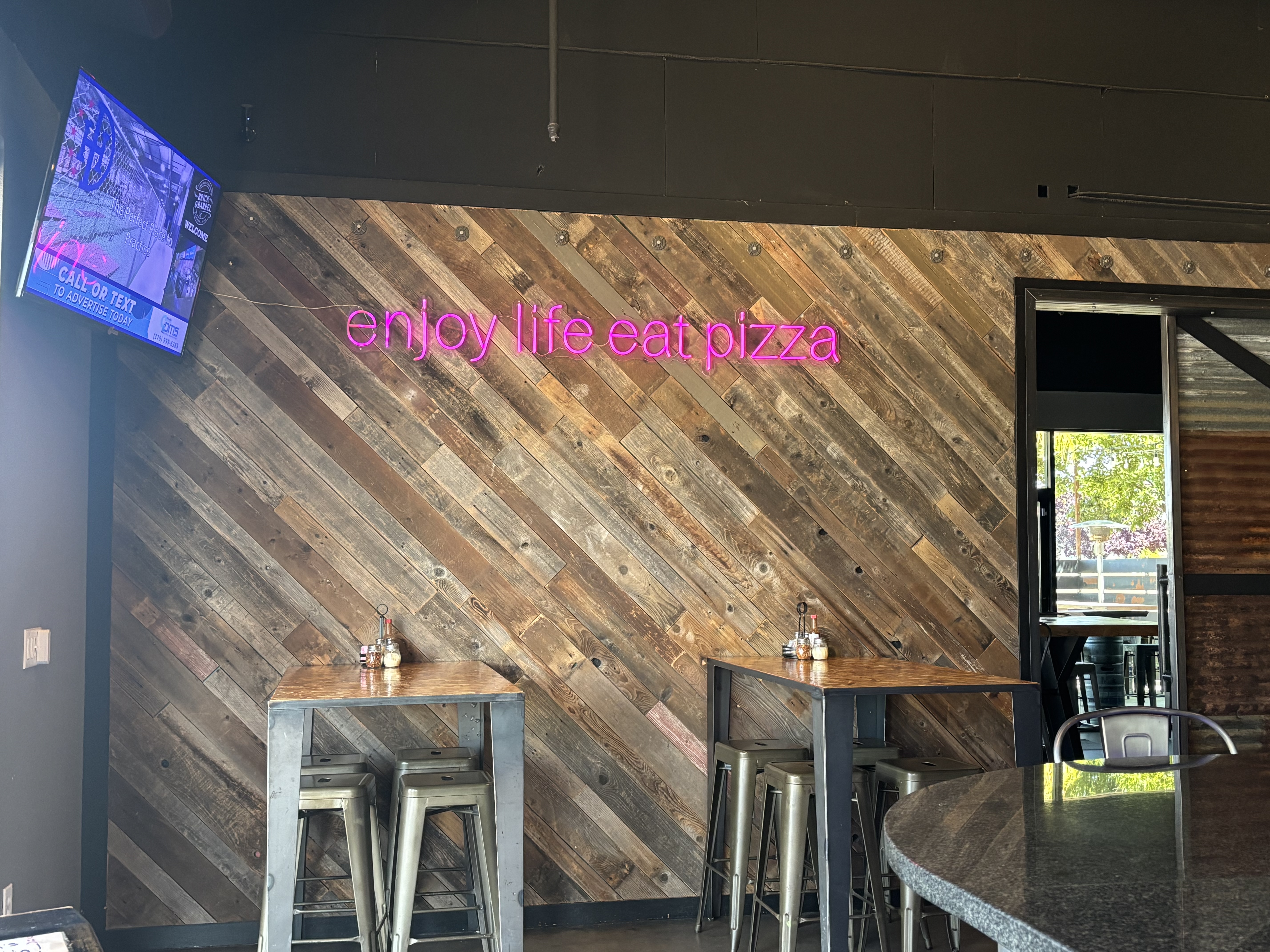 enjoy life eat pizza neon sign